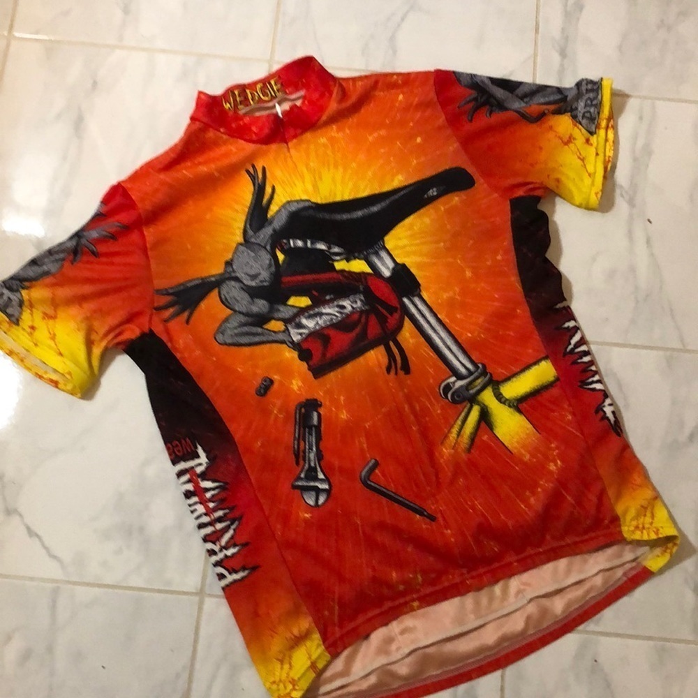 Primal wear biking shirt. Zip front. Back pockets.